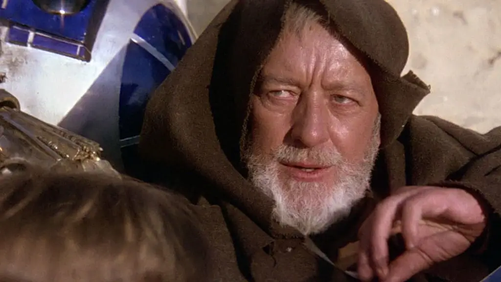 Obi-Wan Kenobi in landspeeder and brown robes
